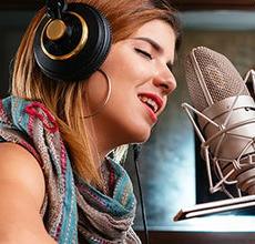 Singer in a recording booth